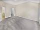 Large carpeted bedroom with access to closet and bathroom at 1394 Orchard Park Dr, Stone Mountain, GA 30083