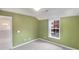 Bedroom showcasing a window with natural light at 1394 Orchard Park Dr, Stone Mountain, GA 30083