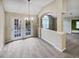 Dining area with chandelier and French door access to outdoor patio at 1394 Orchard Park Dr, Stone Mountain, GA 30083