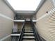 Apartment complex exterior features staircases and multiple dwelling entrances at 1394 Orchard Park Dr, Stone Mountain, GA 30083
