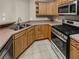 Galley kitchen featuring stainless steel appliances at 1394 Orchard Park Dr, Stone Mountain, GA 30083