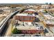 The aerial perspective of the property shows its proximity to train tracks and the city beyond at 500 Means Nw St # F, Atlanta, GA 30318