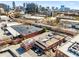 The urban property benefits from an aerial view showing its location near train tracks and city buildings at 500 Means Nw St # F, Atlanta, GA 30318