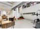 Spacious finished basement with exercise equipment and desk area, perfect for a home office at 500 Means Nw St # F, Atlanta, GA 30318