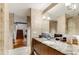Bathroom featuring a sleek vanity with marble countertop, modern fixtures, tiled walls, and wood flooring at 500 Means Nw St # F, Atlanta, GA 30318