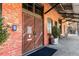 Brick building entrance with double wooden doors and an industrial aesthetic at 500 Means Nw St # F, Atlanta, GA 30318