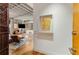 Inviting entryway featuring hardwood floors and an open floor plan with exposed brick accents at 500 Means Nw St # F, Atlanta, GA 30318