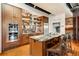 Modern kitchen boasts stainless steel appliances, custom cabinets, granite counters, and a large island at 500 Means Nw St # F, Atlanta, GA 30318
