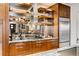 Gourmet kitchen features stainless appliances, custom cabinetry, open shelving, and a granite countertop at 500 Means Nw St # F, Atlanta, GA 30318
