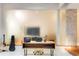 Modern office space with wooden desk, frosted glass divider, and guitar on display at 500 Means Nw St # F, Atlanta, GA 30318