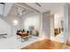 Bright office space features a modern desk, frosted glass, stone wall, and easy access to the bathroom at 500 Means Nw St # F, Atlanta, GA 30318