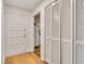 Bright entryway featuring a coat closet and direct access to the kitchen at 702 Hanover Se Ln, Marietta, GA 30067