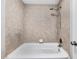 Tiled shower features a handheld shower head at 1445 Monroe Ne Dr # G7, Atlanta, GA 30324