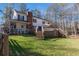 Beautiful home featuring a multi-level deck overlooking a sprawling yard perfect for outdoor gatherings at 1700 Bailey Creek Sw Rd, Conyers, GA 30094