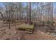 Backyard deck with umbrella and seating at 1700 Bailey Creek Sw Rd, Conyers, GA 30094