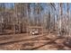 Secluded hammock strung between trees offers an idyllic and peaceful retreat in a private, wooded setting at 1700 Bailey Creek Sw Rd, Conyers, GA 30094