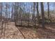 Property with extensive fencing and wooded landscape at 1700 Bailey Creek Sw Rd, Conyers, GA 30094