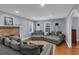 Cozy living room featuring hardwood floors, fireplace, and comfortable seating at 1700 Bailey Creek Sw Rd, Conyers, GA 30094