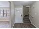 Bright foyer with wood-look flooring, a staircase, and natural light from a large window at 994 Chapman Cir, Stone Mountain, GA 30088