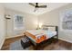 Bright bedroom featuring hardwood floors, ceiling fan and natural light at 1090 Indale Sw Pl, Atlanta, GA 30310