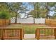 Inviting backyard featuring a new deck and privacy fence at 1183 Mobile Nw St, Atlanta, GA 30314