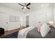 Bedroom featuring modern ceiling fan, hardwood floors and two closets at 1183 Mobile Nw St, Atlanta, GA 30314