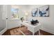 Bright home office with a sleek white desk and stylish decor at 1183 Mobile Nw St, Atlanta, GA 30314