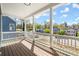 Inviting porch with white railings and wood flooring, offering neighborhood views at 1183 Mobile Nw St, Atlanta, GA 30314