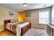 Bedroom showcasing natural light, neutral color palette, and a stylish dresser at 3135 Preservation Cir, Lilburn, GA 30047