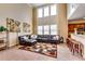 Bright living room featuring high ceilings, large windows, and an open floor plan at 3135 Preservation Cir, Lilburn, GA 30047