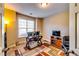 Functional home office featuring neutral tones, natural light, and ample workspace at 3135 Preservation Cir, Lilburn, GA 30047