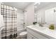 Bright bathroom with a shower and tub and modern vanity at 3610 Silvery Way, Powder Springs, GA 30127