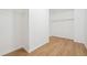 Spacious closet with wood-look flooring and white walls at 6474 E Meyer Dr, Morrow, GA 30260