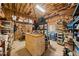 Spacious storage room with exposed beams, shelving, and organization solutions at 1034 Fairview Club Cir, Dacula, GA 30019