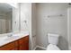 Bathroom featuring a single vanity, toilet and shower/tub combo at 982 Ashton Park Dr, Lawrenceville, GA 30045