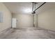 Spacious garage with lighting and concrete floor at 982 Ashton Park Dr, Lawrenceville, GA 30045