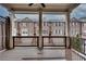 View of a brick townhouse complex from the spacious balcony, featuring a classic design and inviting outdoor space at 110 Rose Garden Ln, Alpharetta, GA 30009