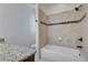 Well-lit bathroom with granite countertop vanity and tiled shower, perfect for a refreshing and stylish experience at 110 Rose Garden Ln, Alpharetta, GA 30009