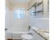 This bathroom features a tub and shower combination, and a vanity with a granite countertop at 2080 Dellwood Pl, Decatur, GA 30032