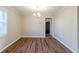 Comfortable dining room showcasing hardwood floors and stylish chandelier at 2080 Dellwood Pl, Decatur, GA 30032