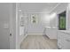 Bright bathroom with a walk-in shower, soaking tub, and double vanity at 2021 Shallowford Rd, Marietta, GA 30066