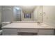 Bathroom showcasing a vanity with drawers and sink, along with a large mirror at 5087 Donnell Way, Decatur, GA 30035