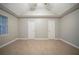 Bedroom featuring tile flooring, neutral walls, vaulted ceiling and natural light from the window at 5087 Donnell Way, Decatur, GA 30035