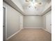 This bedroom features neutral walls, tile flooring, and a ceiling fan for added comfort at 5087 Donnell Way, Decatur, GA 30035