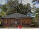 Modest brick house with boarded windows; 'A' sign in the yard at 837 Metropolitan Pkwy, Atlanta, GA 30310