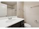 Bathroom vanity sink with dark cabinets and a white countertop at 2293 Chancery Mill Ln, Buford, GA 30519