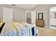 Cozy bedroom with a neutral palette, carpet, and a decorative dresser at 236 Balaban Cir, Woodstock, GA 30188