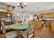 Dining area adjacent to the kitchen featuring hardwood floors and natural light at 236 Balaban Cir, Woodstock, GA 30188