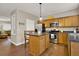 Well-lit kitchen with stainless steel appliances and hardwood flooring at 236 Balaban Cir, Woodstock, GA 30188