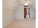 Bedroom with a ceiling fan, neutral colors, carpeted flooring, and a doorway at 4808 Sunview Ct, Suwanee, GA 30024